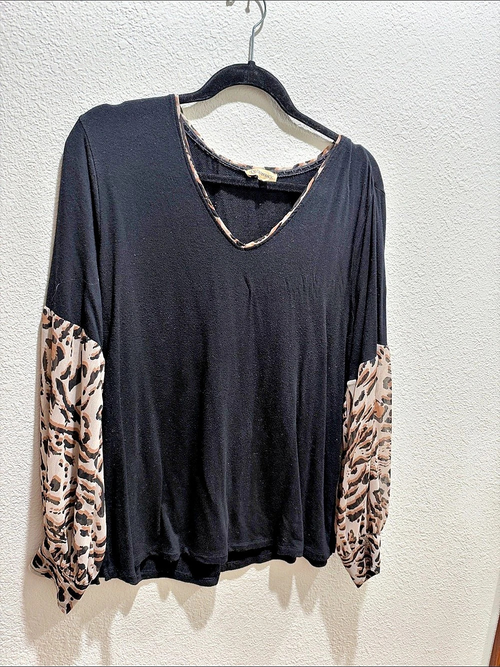 Animal Print Sleeve Blouse in Black mostly.
